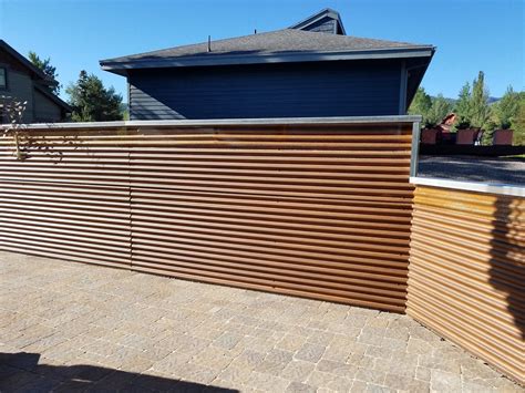 corrugated metal sheet fence|using corrugated metal for fencing.